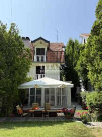 Nekretnina: porodična stambena zgrada sa uknjizenim stanom i garazom ID#5419