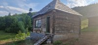 Nekretnina: Prodajem plac sa brvnarama na Zlatiboru